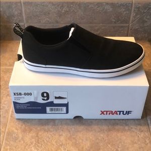 Xtratuf black leather slip-on deck shoes